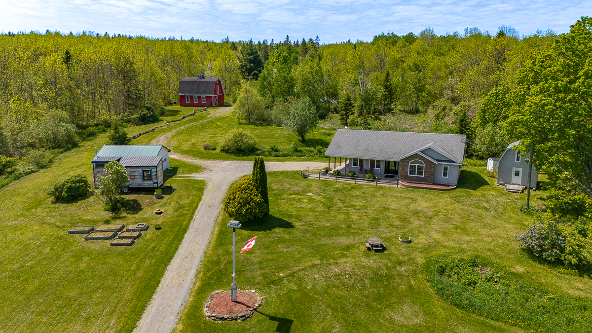 Aerial view of property & buildings | 6800 Route 102, Dumfries, NB E6G 1N9 | Home For Sale with Barn Near Fredericton