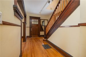 Original hardwood floors and wood millwork in an older Fredericton home